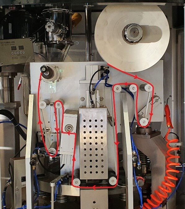 Figure 7 - run paper as follows of coffee capsule filling sealing machine